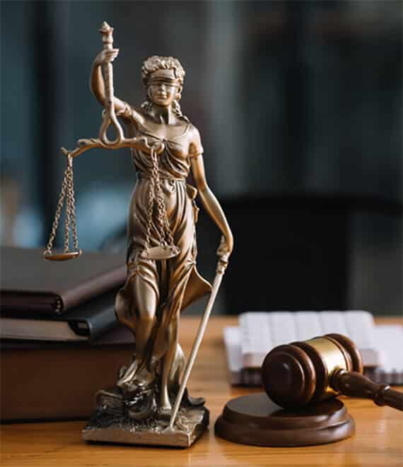 statue-of-lady-justice-on-desk-of-a-judge-or-lawye-SVECXT5-intro.jpg